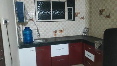 Kitchen Image of 600 Sq.ft 2 BHK Apartment / Flat for rent in Charholi Budruk Pune for Rs. 3810