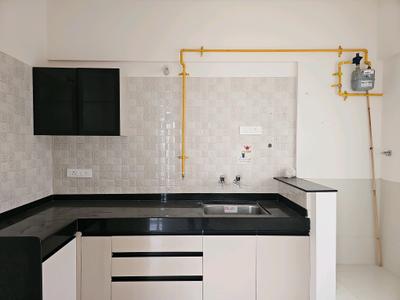 Kitchen Image of 800 Sq.ft 2 BHK Apartment / Flat for sale in Nyati Elan Central, Wagholi Pune for Rs. 6300000