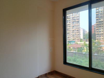 Bedroom Image of 616 Sq.ft 1 BHK Apartment / Flat for sale in Om Swayambhu Siddhivinayak Balaji Residency, Thakurli Thane for Rs. 4950000