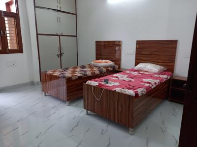 Bedroom Image of SOMO pg in Sector 130, Noida