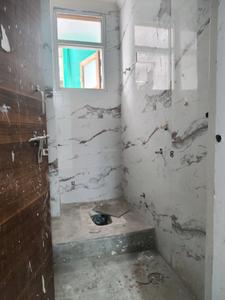 Common Bathroom Image of 685 Sq.ft 2 BHK Apartment / Flat for sale in Khanpur New Delhi for Rs. 3800000