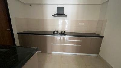 Kitchen Image of 910 Sq.ft 2 BHK Apartment / Flat for rent in Gera World Of Joy, Upper Kharadi Pune for Rs. 40000