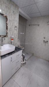 Bathroom Image of 1100 Sq.ft 2 BHK Apartment / Flat for sale in Mahagun Mascot, Crossings Republik Ghaziabad for Rs. 7200000