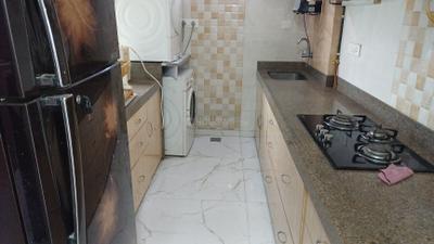 Kitchen Image of 1500 Sq.ft 4 BHK Apartment / Flat for sale in Poddar Shri Ganesh Apartments, Goregaon West Mumbai for Rs. 35000000