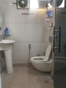 Common Bathroom Image of 2250 Sq.ft 5 BHK Builder Floor for sale in Rajouri Garden New Delhi for Rs. 25000000