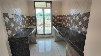 Kitchen Image of 715 Sq.ft 1 BHK Apartment / Flat for sale in Shilphata Thane for Rs. 3650000