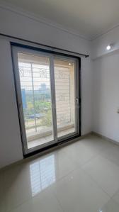 Bedroom Image of 550 Sq.ft 1 BHK Apartment / Flat for rent in Arihant Aarohi, Shilgaon Thane for Rs. 16000