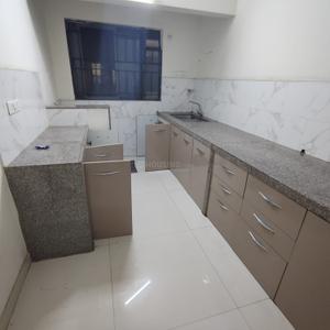 Kitchen Image of 1000 Sq.ft 2 BHK Apartment / Flat for rent in Kumar Park Infinia I1 I2 I3 J2 J3 And K1, Fursungi Pune for Rs. 23000