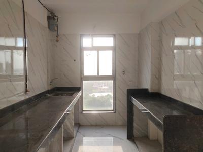 Kitchen Image of 650 Sq.ft 2 BHK Apartment / Flat for sale in Dharti Pressidio, Kandivali West Mumbai for Rs. 13700000