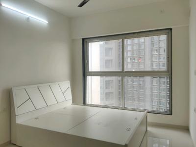 Bedroom Image of 735 Sq.ft 2 BHK Apartment / Flat for sale in Nirmal City Of Joy, Mulund West Mumbai for Rs. 17800000