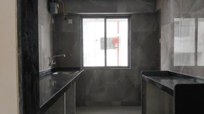 Kitchen Image of 830 Sq.ft 2 BHK Apartment / Flat for sale in Goregaon West Mumbai for Rs. 19000000