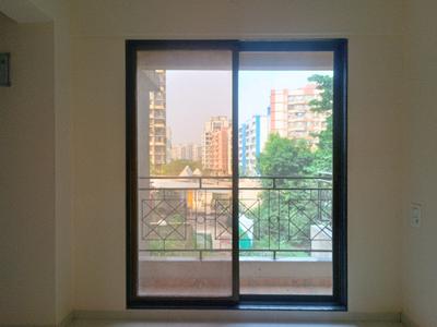 Living Room Image of 616 Sq.ft 1 BHK Apartment / Flat for sale in Om Swayambhu Siddhivinayak Balaji Residency, Thakurli Thane for Rs. 4950000