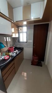 Kitchen Image of 660 Sq.ft 1 BHK Apartment / Flat for rent in Ajmera Exotica, Wagholi Pune for Rs. 15000