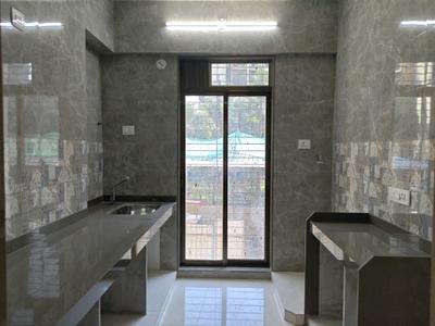 Kitchen Image of 650 Sq.ft 1 BHK Apartment / Flat for sale in Thakurli Thane for Rs. 4743000