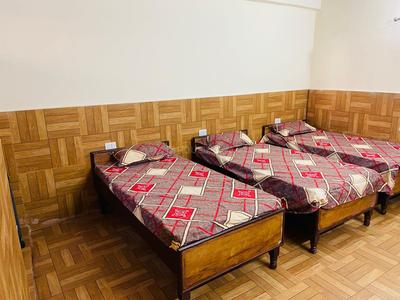 Bedroom Image of Aman pg and rooms  in Nagla Nagli, Noida