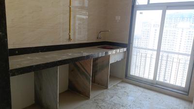 Kitchen Image of 710 Sq.ft 1 BHK Apartment / Flat for sale in Bhagwati Belmont, Kasarvadavali Thane for Rs. 5990000