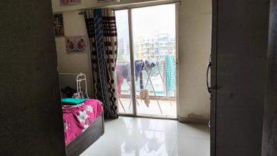 Bedroom Image of 950 Sq.ft 2 BHK Apartment / Flat for rent in Lohegaon Pune for Rs. 25000