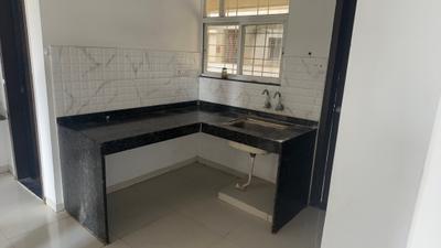 Kitchen Image of 830 Sq.ft 2 BHK Apartment / Flat for sale in Majestique Manhattan, Wagholi Pune for Rs. 4600000