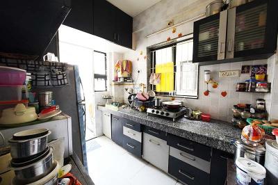 Kitchen Image of 990 Sq.ft 2 BHK Apartment / Flat for sale in Adalaj Gandhinagar for Rs. 4800000