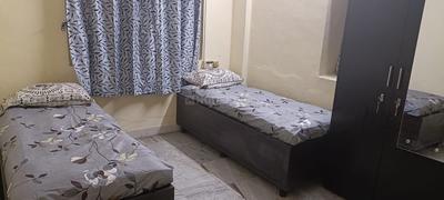Bedroom Image of Feelhome pg services in Kopar Khairane, Navi Mumbai