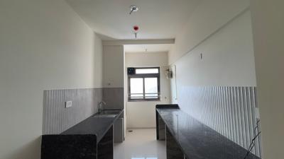 Kitchen Image of 1150 Sq.ft 2 BHK Apartment / Flat for rent in Kalptaru Srishti Namah, Mira Road East Mira Bhayandar for Rs. 38500