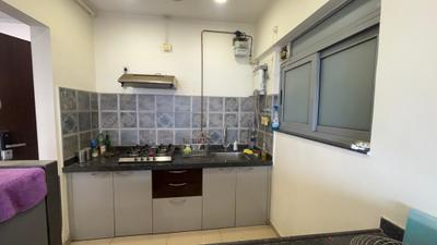 Kitchen Image of 730 Sq.ft 1.5 BHK Builder Floor for rent in Amanora Future Towers, Hadapsar Pune for Rs. 40000