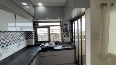 Kitchen Image of 1215 Sq.ft 2 BHK Apartment / Flat for rent in Kavish Karnavati Riviera, New Maninagar Ahmedabad for Rs. 25000