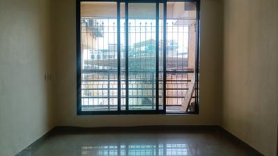 Living Room Image of 660 Sq.ft 1 BHK Apartment / Flat for rent in Bhoomi Dhara Apartment, Kamothe Navi Mumbai for Rs. 18500