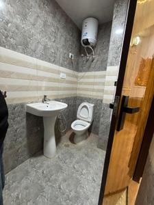 Bathroom Image of 600 Sq.ft 1 RK Studio for rent in Noida Extension Greater Noida for Rs. 16000