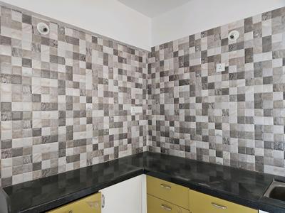 Kitchen Image of 1350 Sq.ft 2.5 BHK Apartment / Flat for sale in Wagholi Pune for Rs. 10700000