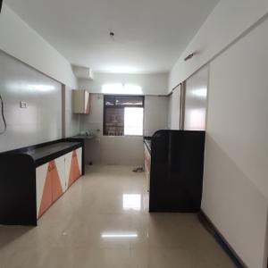 Kitchen Image of 818 Sq.ft 2 BHK Apartment / Flat for sale in Treesourus, Malad West Mumbai for Rs. 25000000