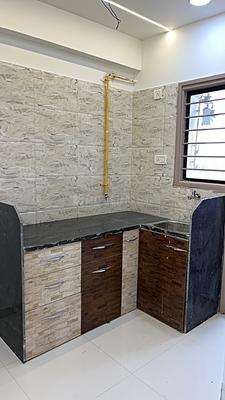 Kitchen Image of 692 Sq.ft 1 BHK Apartment / Flat for sale in Rashmi Vihar, Narolgam Ahmedabad for Rs. 1950000