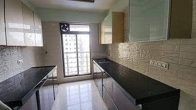 Kitchen Image of 1300 Sq.ft 3 BHK Apartment / Flat for rent in Namla Fortune Mignas, Agripada Mumbai for Rs. 155000