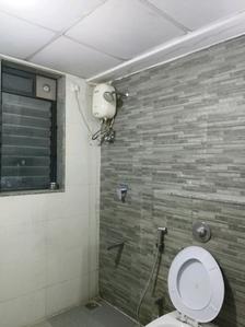 Common Bathroom Image of 600 Sq.ft 1 BHK Apartment / Flat for sale in Lodha Palava Downtown, Palava Phase 2 Thane for Rs. 2800000
