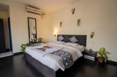 Bedroom Image of HelloWorld Riverbankinn in Morjim, Goa