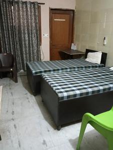 Bedroom Image of Apna niwas pg  in Sector 22, Noida