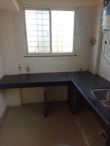 Kitchen Image of 576 Sq.ft 1 BHK Apartment / Flat for sale in Wagholi Pune for Rs. 3000000