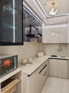 Kitchen Image of 810 Sq.ft 3 BHK Apartment / Flat for sale in Hans Builders Floor, Dwarka Mor New Delhi for Rs. 5500000