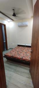Bedroom Image of 900 Sq.ft 2 BHK Builder Floor for rent in Ramesh Nagar New Delhi for Rs. 29000