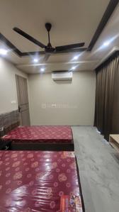 Bedroom Image of Girls pg in Sector 57, Gurgaon