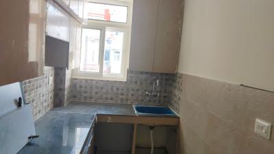 Kitchen Image of 915 Sq.ft 2 BHK Apartment / Flat for sale in Antriksh India Antriksh NRI City, BHEL Township Haridwar for Rs. 3900000