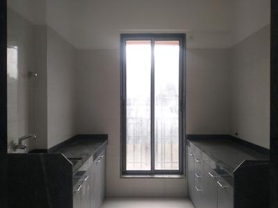 Kitchen Image of 625 Sq.ft 1 BHK Apartment / Flat for sale in Neminath Hiloni Heights, Fatherwadi Vasai for Rs. 3700000