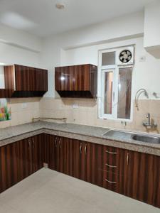 Kitchen Image of 935 Sq.ft 2 BHK Apartment / Flat for rent in Arihant Arden, Noida Extension Greater Noida for Rs. 17000