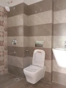 Bedroom Two Image of 1309 Sq.ft 3 BHK Apartment / Flat for sale in Ascon Era, New Town Kolkata for Rs. 12000000