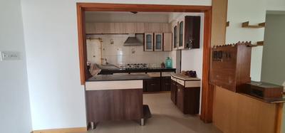Kitchen Image of 1575 Sq.ft 3 BHK Apartment / Flat for sale in Shree Ami Infrastructure Pearl Apartments, Shyamal Ahmedabad for Rs. 9500000