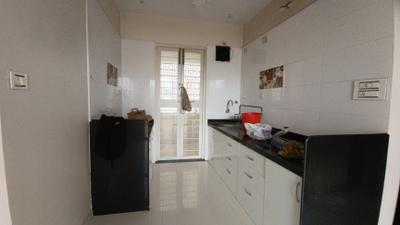 Kitchen Image of 1080 Sq.ft 2 BHK Apartment / Flat for rent in Goel Ganga Glitz, Undri Pune for Rs. 23500