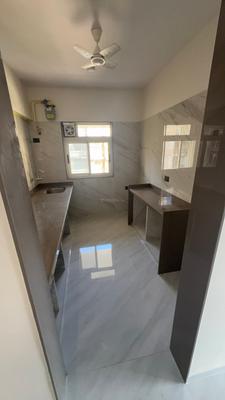 Kitchen Image of 860 Sq.ft 2 BHK Apartment / Flat for sale in Kabra Garnet, Malad West Mumbai for Rs. 23000000