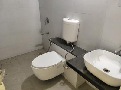 Common Bathroom Image of 600 Sq.ft 1 BHK Apartment / Flat for sale in Godrej Vanaangan, Jagatpur Ahmedabad for Rs. 3700000