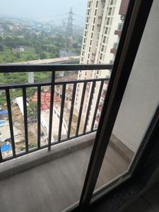 Balcony Image of 690 Sq.ft 1 BHK Apartment / Flat for rent in Shilphata Thane for Rs. 14000