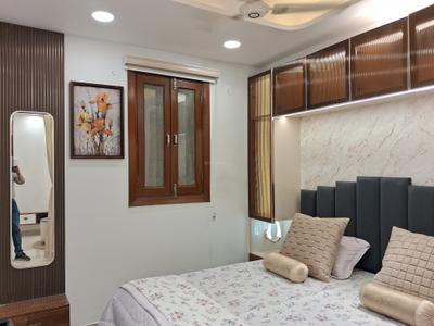 Bedroom Image of 700 Sq.ft 2 BHK Builder Floor for rent in Dwarka Mor New Delhi for Rs. 20500